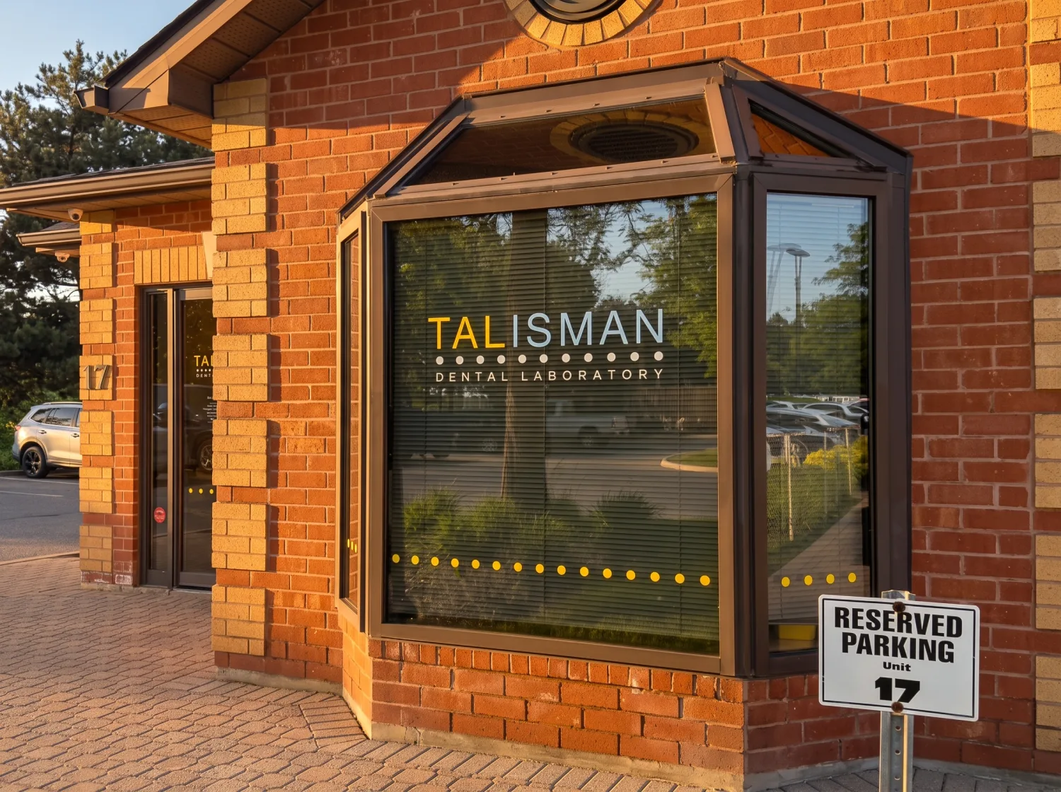 Interior of Talisman Dental Laboratory — technicians and fabrication benches